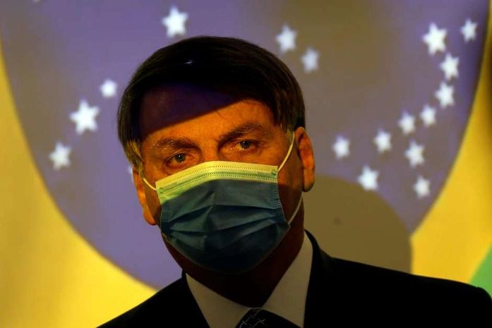 Bolsonaro a repórter: 'Vontade de encher a boca de porrada'