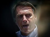 Bolsonaro reclama de pressão por vacina e dispara: ‘Só se for na casa da tua mãe’