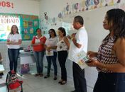 Panfletagem e diálogo sobre o novo sistema de coleta do lixo na cidade