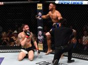 Com arbitragem polêmica de Yamasaki, Kevin Lee superou Michael Chiesa no UFC Oklahoma (Foto: Getty Images)